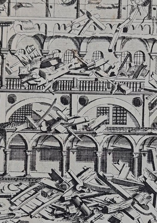 Dettaglio delle rovine e delle travi spezzate